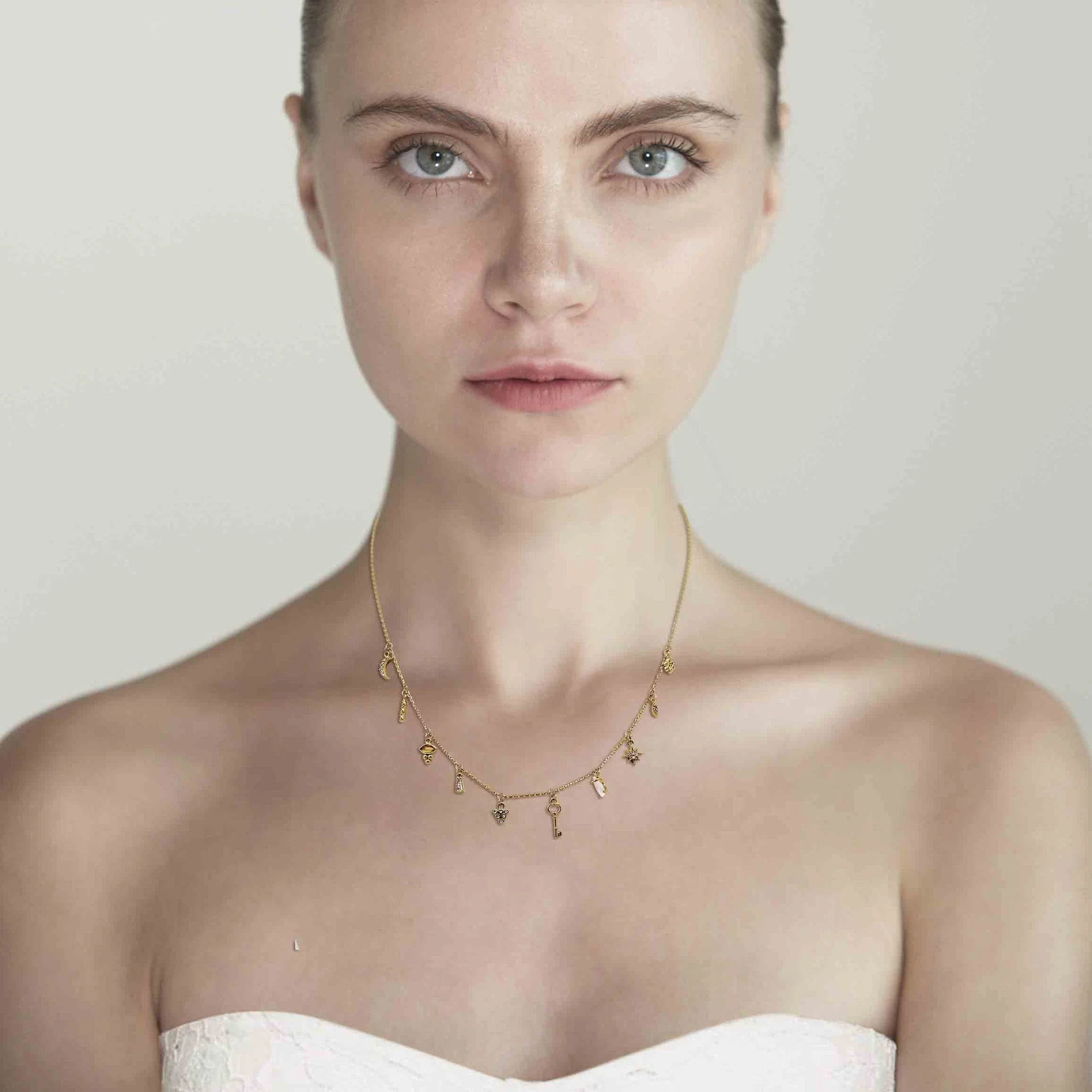 Gold Necklace With Stationed Charms - Image 2